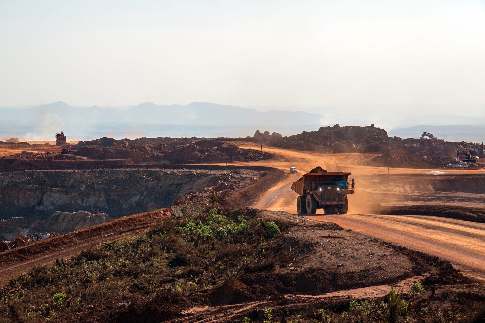 Dump truck on a haul road in an open-pit mine