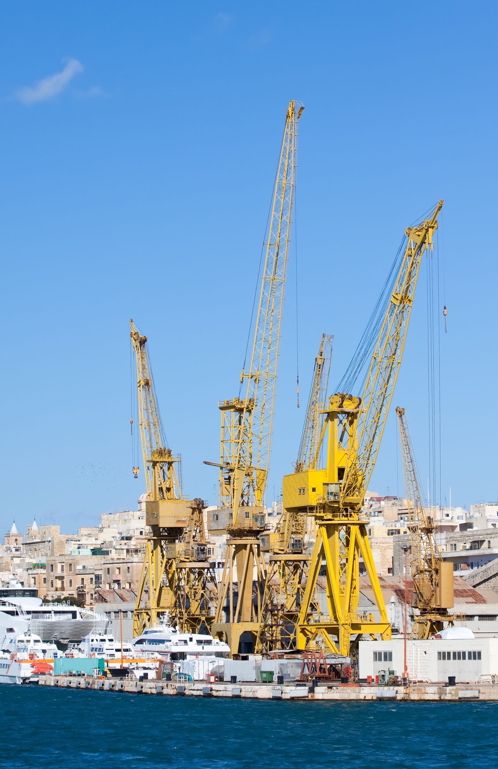 Yellow cranes at a dry dock